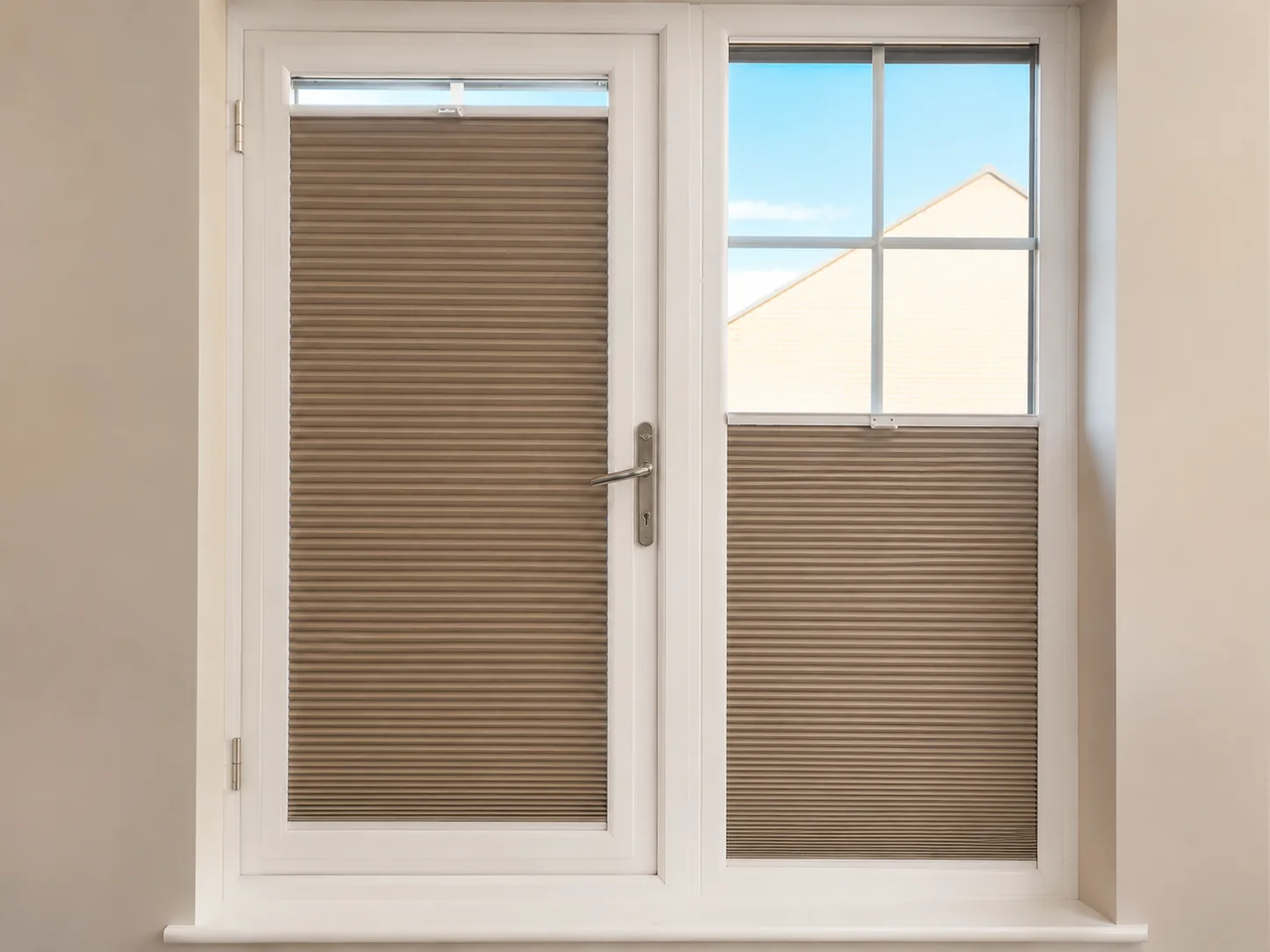 Beige pleated blinds fitted neatly within white glazed door frames